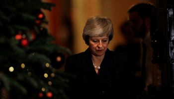 Britain's Prime Minister Theresa May prepares to speak outside 10 Downing Street after a confidence vote by Conservative Party Members of Parliament (MPs), in London, December 12, 2018 (Reuters/Eddie Keogh)