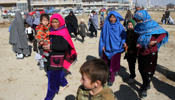 Hazara civilians arrive in Ghazni town after fleeing fighting in Malistan and Jaghori districts (Reuters/Mustafa Andaleb)
