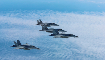 Japanese and US fighter jets conduct an air exercise above the Sea of Japan (Reuters/Air Staff Office of the Defense Ministry of Japan)