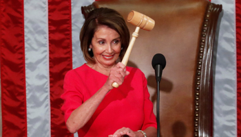 Nancy Pelosi holds the House speaker’s gavel after being elected to the post, January 3 (Reuters/Leah Millis)