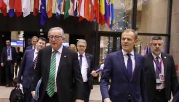 European Commission President Jean-Claude Juncker and European Council President Donald Tusk leaving an EU summit in Brussels, December 14 (Reuters/Yves Herman)