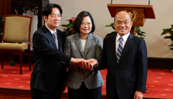 (L-R) Former premier William Lai, Taiwan President Tsai Ing-wen and new premier Su Tseng-chang join hands after a news conference in Taipei, Taiwan January 11 (Reuters/Fabian Hamacher)