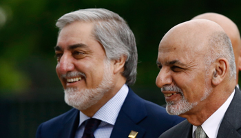 President Mohammad Ashraf Ghani (R) with Chief Executive Abdullah Abdullah (Reuters/Kacper Pempel)