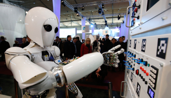 A humanoid robot AILA (artificial intelligence lightweight android) operates a switchboard during a demonstration at the CeBit computer fair in Hanover (Reuters/Fabrizio Bensch)