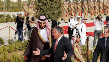 Jordan's King Abdullah (2nd L) speaks with Saudi Arabia's Deputy Crown Prince Mohammed bin Salman (L), upon his arrival at the Royal Palace in Amman, Jordan, August 2015 (Reuters/Muhammad Hamed)