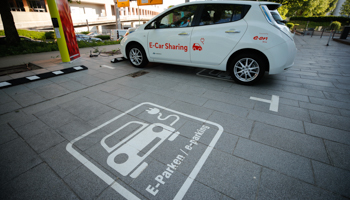 Electric car parking place with chargers outside of the German utility E.ON headquarters in Essen, Germany (Reuters/Wolfgang Rattay)