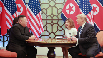 North Korea's leader Kim Jong Un and US President Donald Trump talk during the second North Korea-US summit in Hanoi, Vietnam (Reuters/KCNA)