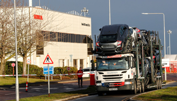 A lorry with car carrier trailer leaves the Honda car plant in Swindon, United Kingdom, February 18 (Reuters/Eddie Keogh)