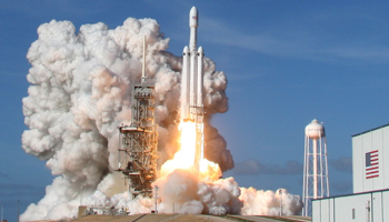 A SpaceX Falcon Heavy rocket lifts off from Kennedy Space Center (Reuters/Thom Baur)