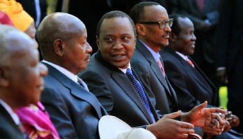 Ugandan President Yoweri Museveni, Kenyan President Uhuru Kenyatta and Rwandan President Paul Kagame attend a regional infrastructure summit (Reuters/Noor Khamis)