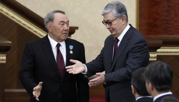 Outgoing President Nursultan Nazarbayev (L) with his interim replacement Kassym-Jomart Tokayev (Reuters/Mukhtar Kholdorbekov)
