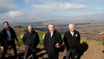 Israeli Prime Minister Binyamin Netanyahu, US Republican Senator Lindsey Graham and US Ambassador to Israel David Friedman visit the border line between Israel and Syria at the Israeli-occupied Golan Heights, March 11 (Reuters/Ronen Zvulun)
