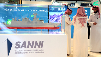 An exhibition stand showcases a naval joint venture between Saudi Arabian Military Industries and Spain's Navantia, February 17 (Reuters/Christopher Pike)