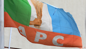 An All Progressives Congress (APC) flag outside the party’s national headquarters in Abuja (Reuters/Afolabi Sotunde)