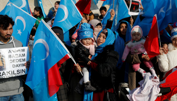 Uighurs take part in a protest against China in Istanbul, Turkey (Reuters/Murad Sezer)