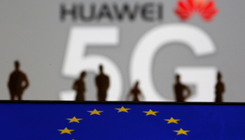 Huawei and 5G network logo above the European flag, March 30, 2019 (Reuters/Dado Ruvic)