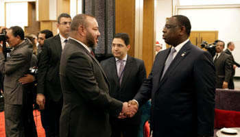 King Mohammed VI of Morocco shakes hands with the President of Senegal Macky Sall, Marrakech, Morocco, November 16, 2016 (Reuters/Youssef Boudlal)