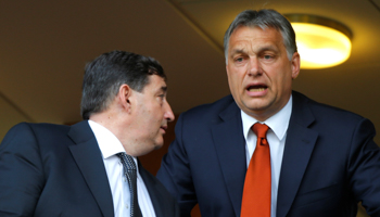 Hungarian Prime Minister Viktor Orban (R) at a football match with Lorinc Meszaros in Felcsut, April 21, 2014 (Reuters/Laszlo Balogh)