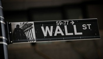 A Wall St. street sign near the New York Stock Exchange (NYSE), March 7 (Reuters/Brendan McDermid)