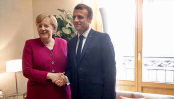 German Chancellor Angela Merkel greets French President Emmanuel Macron in Brussels, Belgium May 28, 2019 (Reuters/Oliver Matthys)