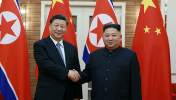 North Korean leader Kim Jong Un shakes hands with China's President Xi Jinping during Xi's visit in Pyongyang, North Korea (Reuters/Korean Central News Agency)