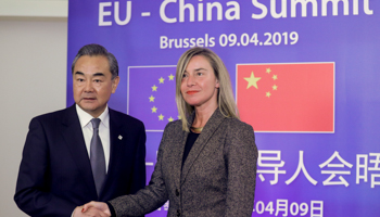 High Representative Federica Mogherini welcomes Chinese Foreign Minister Wang Yi to a meeting in Brussels, April 9 (Reuters/Olivier Hoslet)