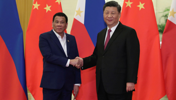 Philippine President Rodrigo Duterte shakes hands with Chinese President Xi Jinping before the meeting at the Great Hall of People in Beijing, China on April 25, 2019.  Kenzaburo Fukuhara/Pool via (Reuters/)