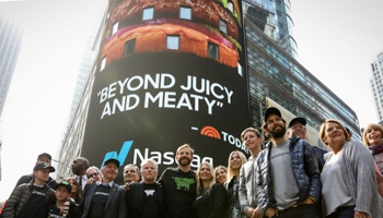 Ethan Brown, founder and CEO of Beyond Meat, poses with company executives and guests during the company's IPO at the Nasdaq Market site in New York, May 2 (Reuters/Brendan McDermid)