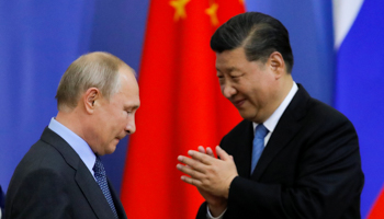 Russian President Vladimir Putin and Chinese President Xi Jinping (Reuters/Dmitri Lovetsky)