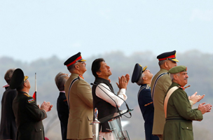 Pakistan’s Prime Minister Imran Khan (fourth from right) at a military parade (Reuters/Akhtar Soomro)