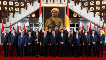 Members of the new Kurdistan Regional Government cabinet pose for a photograph (Reuters/Azad Lashkari)