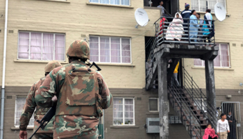 Soldiers patrol in Manenberg township, Cape Town (Reuters/Shafiek Tassiem)
