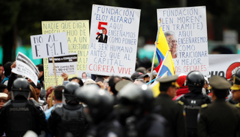 Supporters of former President Rafael Correa protest against President Lenin Moreno (Reuters/Daniel Tapia)