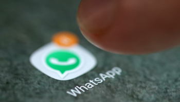 The WhatsApp app logo on a smartphone (Reuters/Dado Ruvic)