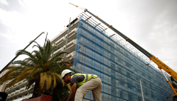 Renovating a building expected to open as the Grand Hyatt Hotel, Athens, May 23, 2018 (Reuters/Costas Baltas)