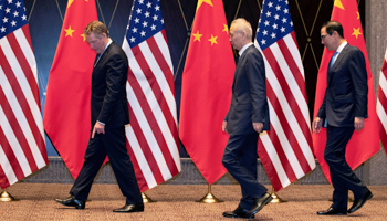 US Trade Representative Robert Lighthizer points at markers on the floor as he leads Chinese Vice Premier Liu He and Treasury Secretary Steven Mnuchin to their position for a family photo at the Xijiao Conference Center in Shanghai, China, July 31 (Reuters/Ng Han Guan)