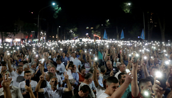 Supporters of the opposition party attend an anti-government protest in front of the prime minister's office in Tirana, July 8 (Reuters/Florion Goga)