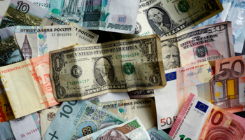 Bank notes of different currencies, including Euro, U.S. Dollar, Turkish Lira or Brazilian Reais (Reuters/Kai Pfaffenbach)