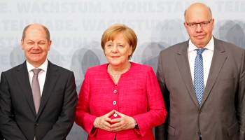 German Finance Minister Olaf Scholz, German Chancellor Angela Merkel and German Economy Minister Peter Altmaier in Berlin, Germany, June 15, 2018 (Reuters/Michele Tantussi)