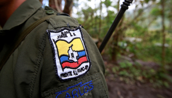 A FARC member pictured at a camp in the Cordillera Oriental in 2016 (Reuters/John Vizcaino)