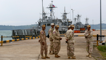 Sailors stand guard near petrol boats at the Cambodian Ream Naval Base in Sihanoukville, Cambodia (Reuters/Samrang Pring)