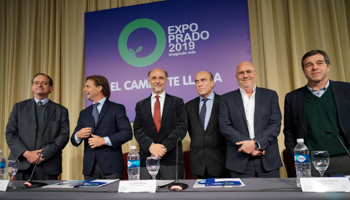 The presidential candidates pose for a photo at an agricultural exposition in Montevideo (Reuters/Mariana Greif)