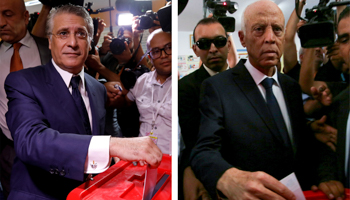 Presidential candidates Nabil Karoui (left) and Kais Saied casting their vote during the second round of a presidential election in Tunis, Tunisia (Reuters/Zoubeir Souissi, Amine Ben Aziza)
