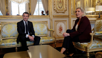 French President Emmanuel Macron attends a meeting with French far-right National Rally (Rassemblement National) party leader Marine Le Pen at the Elysee Palace in Paris, France, February 6 (Reuters/Philippe Wojazer/Pool)