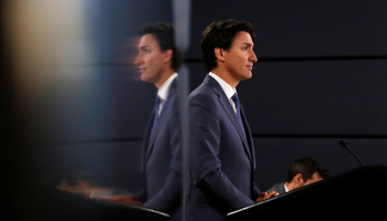 Canada's Prime Minister Justin Trudeau speaks to the news media for the first time since winning a minority government in the federal election, at the National Press Theatre in Ottawa, Ontario, Canada October 23 (Reuters/Stephane Mahe)