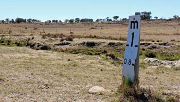 A water level indicator stands next to a near-empty creek near the town of Uralla in rural Australia, September 24 (Reuters/Jonathan Barrett)