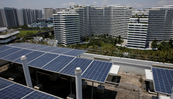 Solar panels on the roof of a public housing block in Singapore (Reuters/Thomas White)