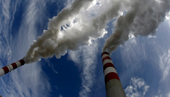 Smoke billows from the chimneys of Belchatow Power Station, May 7 2009 (Reuters/Peter Andrews)