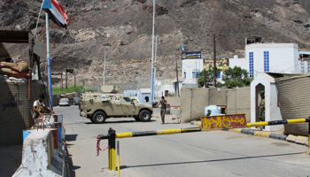 Separatist fighters stand guard outside the STC headquarters in Aden, November 5 (Reuters/Fawaz Salman)