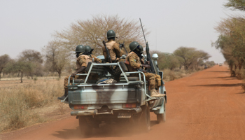 Burkinabe soldiers patrol on the road of Gorgadji in the Sahel region, Burkina Faso, March 3 (Reuters/Luc Gnago)